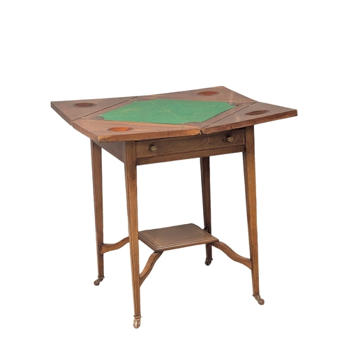 859A - A Late 19th Century Sheraton Revival inlaid mahogany envelope games table with drawer. Circa 1890s. ... 