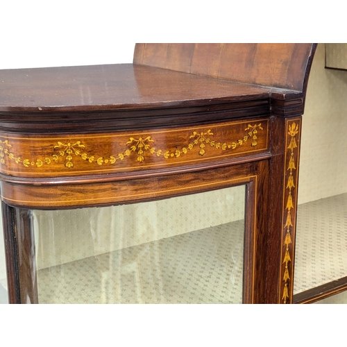 935A - A Late 19th Sheraton Revival inlaid mahogany bow front display cabinet. Circa 1890-1900. 116x41.5x19... 