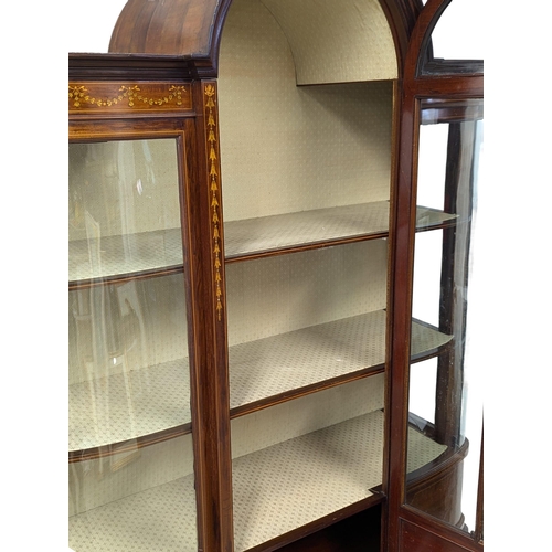 935A - A Late 19th Sheraton Revival inlaid mahogany bow front display cabinet. Circa 1890-1900. 116x41.5x19... 