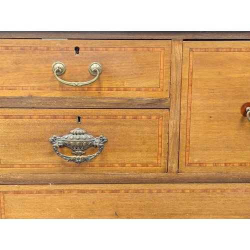 921A - A large Edwardian inlaid mahogany chest of drawers with gallery back. Circa 1910. 121x57x127cm. 1