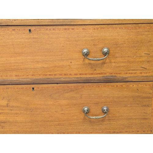 921A - A large Edwardian inlaid mahogany chest of drawers with gallery back. Circa 1910. 121x57x127cm. 1