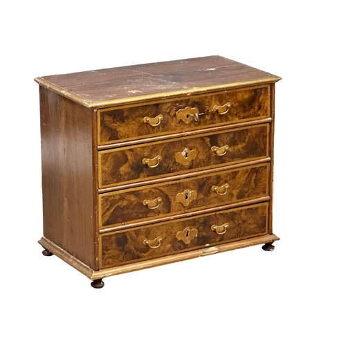 1084 - A Late 18th Century North European scumbled pine chest of drawers. Circa 1780-1800. 73x38x62cm.(11)