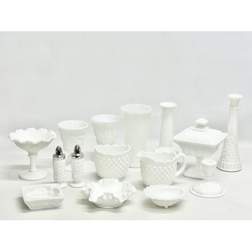 69 - A collection of Early and Mid 20th Century milk glass. Including Fenton and Westmoreland. Compotes, ... 