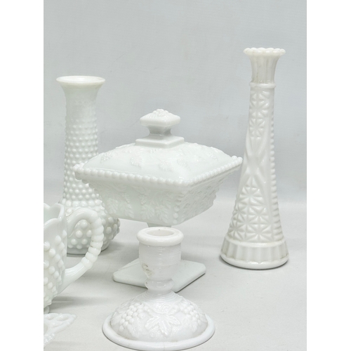 69 - A collection of Early and Mid 20th Century milk glass. Including Fenton and Westmoreland. Compotes, ... 