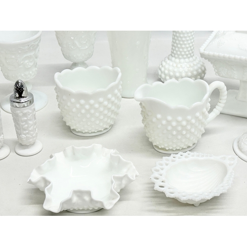 69 - A collection of Early and Mid 20th Century milk glass. Including Fenton and Westmoreland. Compotes, ... 