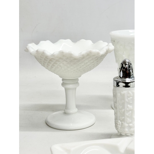 69 - A collection of Early and Mid 20th Century milk glass. Including Fenton and Westmoreland. Compotes, ... 