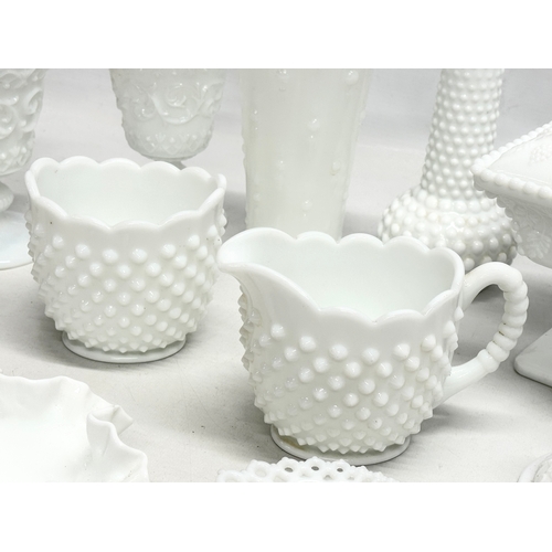 69 - A collection of Early and Mid 20th Century milk glass. Including Fenton and Westmoreland. Compotes, ... 