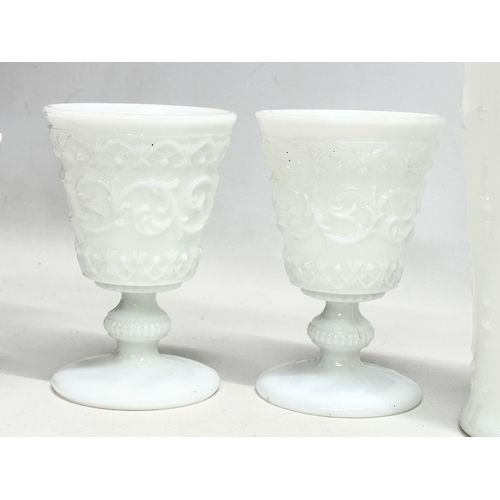 69 - A collection of Early and Mid 20th Century milk glass. Including Fenton and Westmoreland. Compotes, ... 