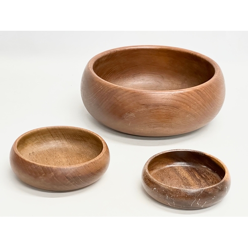 520 - Three Mid Century teak bowls. Fruit bowl 25x10cm.