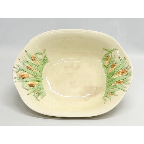 587 - A 1930’s Clarice Cliff “Corncob” bowl by Newport Pottery & Co. 29x23.5x6cm