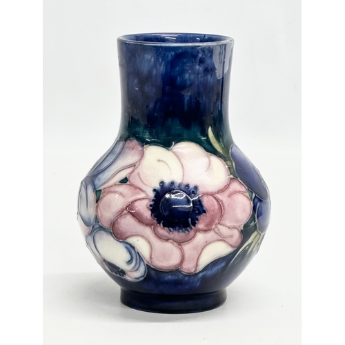 137 - A Moorcroft Pottery “Anemone” vase. 12.5cm.