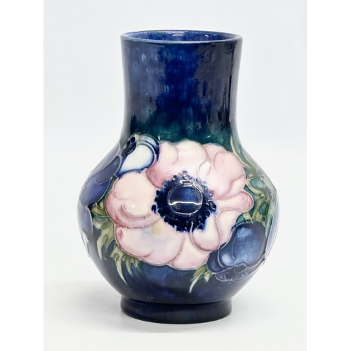 137 - A Moorcroft Pottery “Anemone” vase. 12.5cm.