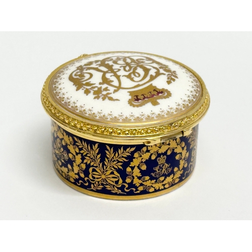 521 - Dubarry, Limoges. Two hand painted porcelain egg shaped trinket boxes, Dubarry Limoges, France. Incl... 