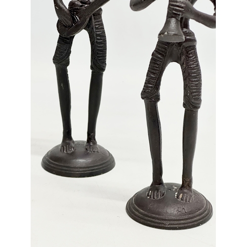 525 - A pair of African brass musicians. Bronzed. 30cm