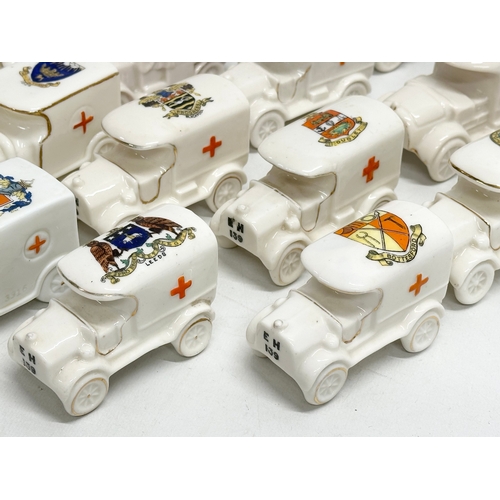 519 - A collection of 37 Early 20th Century crested china WW1 trucks. Arcadian, Carlton China, Warwick, Wi... 