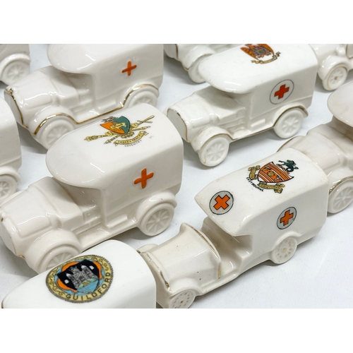 519 - A collection of 37 Early 20th Century crested china WW1 trucks. Arcadian, Carlton China, Warwick, Wi... 