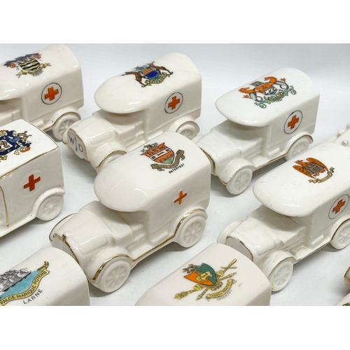 519 - A collection of 37 Early 20th Century crested china WW1 trucks. Arcadian, Carlton China, Warwick, Wi... 