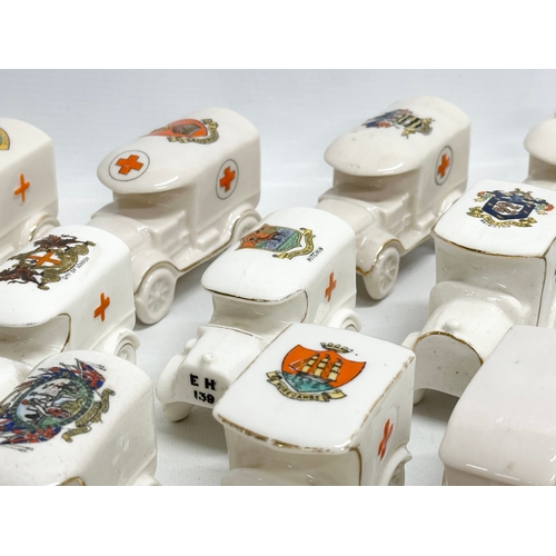 519 - A collection of 37 Early 20th Century crested china WW1 trucks. Arcadian, Carlton China, Warwick, Wi... 