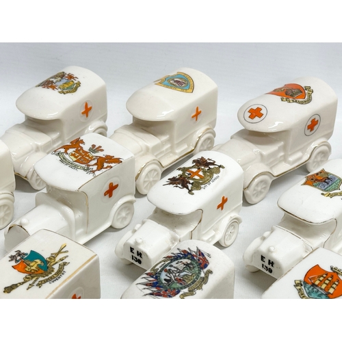 519 - A collection of 37 Early 20th Century crested china WW1 trucks. Arcadian, Carlton China, Warwick, Wi... 