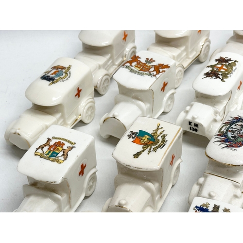 519 - A collection of 37 Early 20th Century crested china WW1 trucks. Arcadian, Carlton China, Warwick, Wi... 