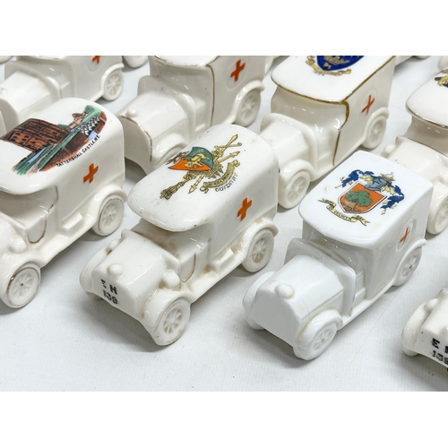 519 - A collection of 37 Early 20th Century crested china WW1 trucks. Arcadian, Carlton China, Warwick, Wi... 