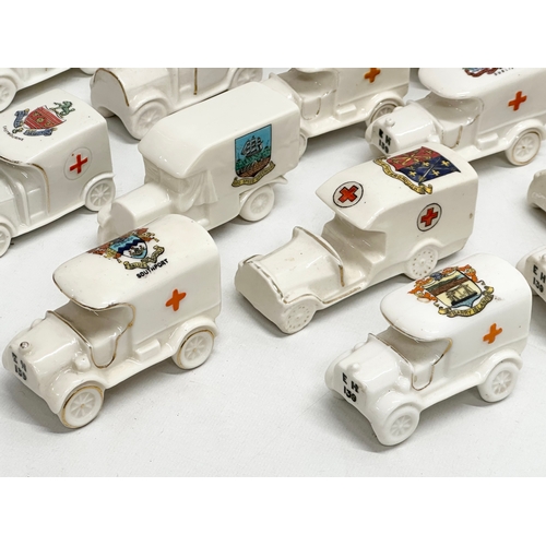 516 - A collection of 28 Early 20th Century crested china WWI trucks. Arcadian, Carlton China, Willow Art,... 