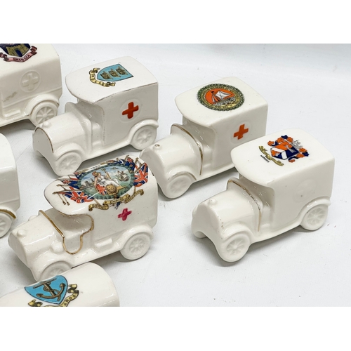 516 - A collection of 28 Early 20th Century crested china WWI trucks. Arcadian, Carlton China, Willow Art,... 