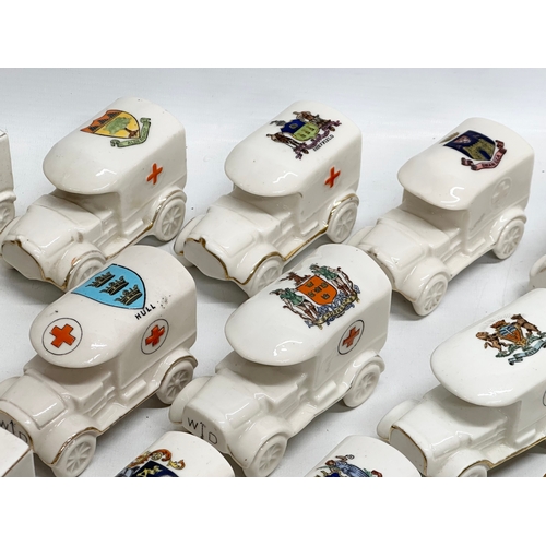 516 - A collection of 28 Early 20th Century crested china WWI trucks. Arcadian, Carlton China, Willow Art,... 