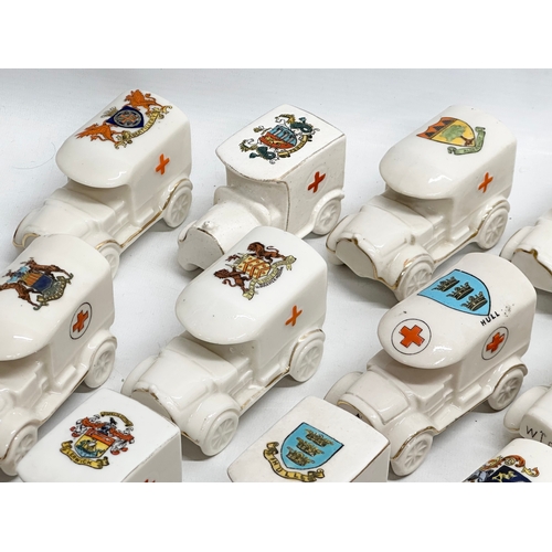 516 - A collection of 28 Early 20th Century crested china WWI trucks. Arcadian, Carlton China, Willow Art,... 