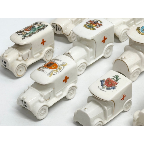 516 - A collection of 28 Early 20th Century crested china WWI trucks. Arcadian, Carlton China, Willow Art,... 