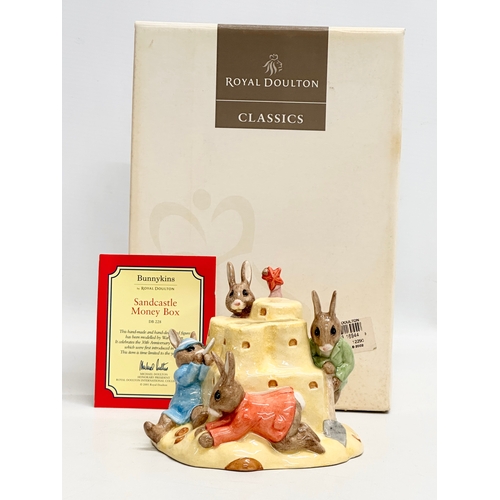 850 - A Limited Edition Royal Doulton Bunnykins “Sandcastle Money Box” with box.