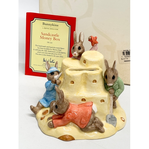 850 - A Limited Edition Royal Doulton Bunnykins “Sandcastle Money Box” with box.