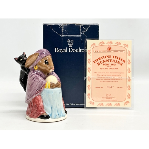 854 - A Limited Edition Royal Doulton “Fortune Teller Bunnykins” toby jug with box and certificate. 14cm