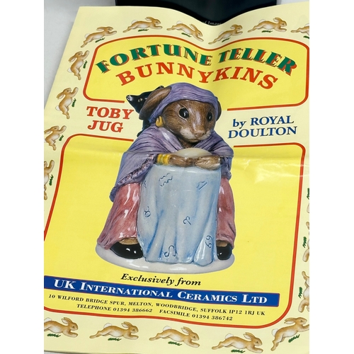 855 - A Limited Edition Royal Doulton “Fortune Teller Bunnykins” toby jug with box. 14cm