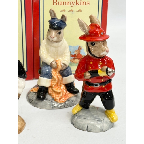 865 - 12 Royal Doulton Bunnykins figurines with boxes.