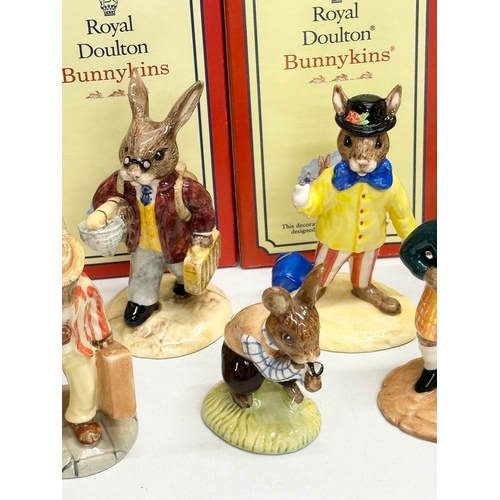 865 - 12 Royal Doulton Bunnykins figurines with boxes.