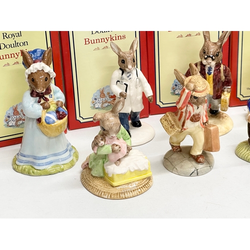 865 - 12 Royal Doulton Bunnykins figurines with boxes.