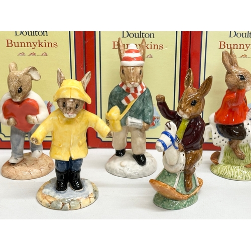 867 - 12 Royal Doulton Bunnykins figurines with boxes.