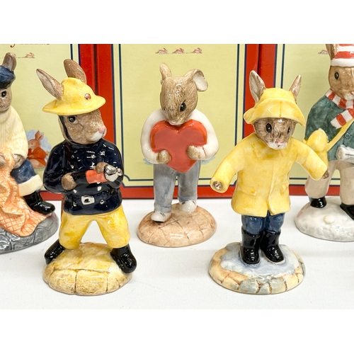 867 - 12 Royal Doulton Bunnykins figurines with boxes.