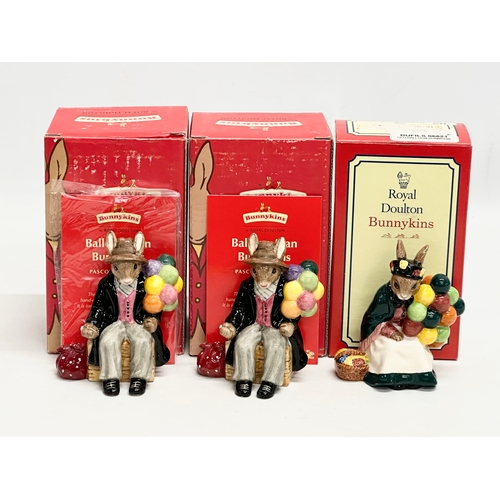 870 - Royal Doulton Bunnykins. Two Royal Doulton Bunnykins “Balloon Man” figurines. A Royal Doulton Bunnyk... 