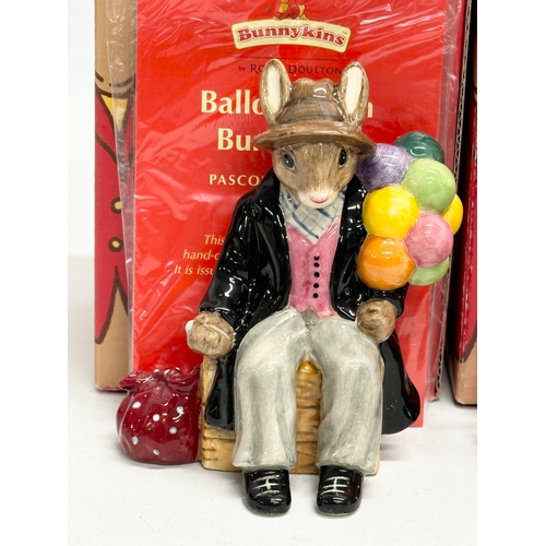 870 - Royal Doulton Bunnykins. Two Royal Doulton Bunnykins “Balloon Man” figurines. A Royal Doulton Bunnyk... 