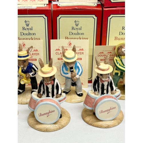 890 - 11 Royal Doulton Bunnykins The Jazz Band Collection, together with a Royal Doulton Rock and Roll Bun... 