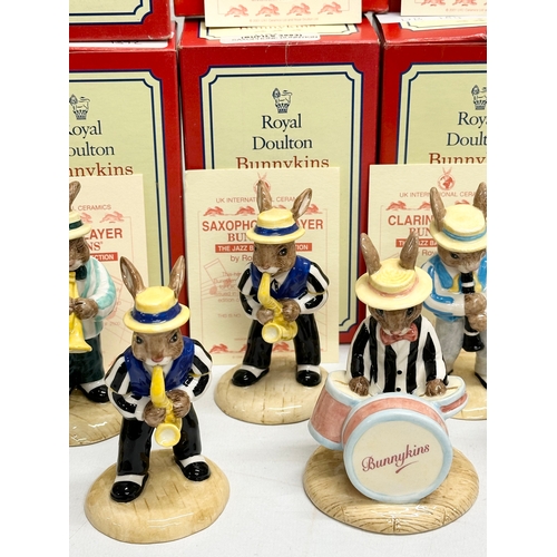 890 - 11 Royal Doulton Bunnykins The Jazz Band Collection, together with a Royal Doulton Rock and Roll Bun... 