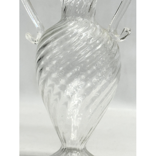 37 - A Late 18th/Early 19th Century wrythen glass vase. 14x21cm