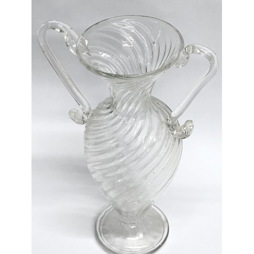 37 - A Late 18th/Early 19th Century wrythen glass vase. 14x21cm