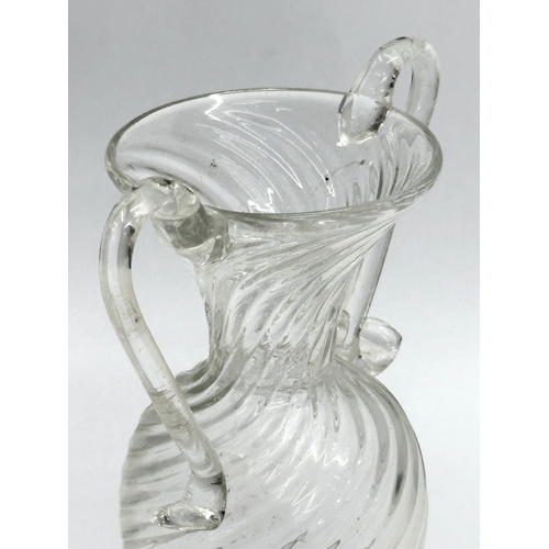 37 - A Late 18th/Early 19th Century wrythen glass vase. 14x21cm