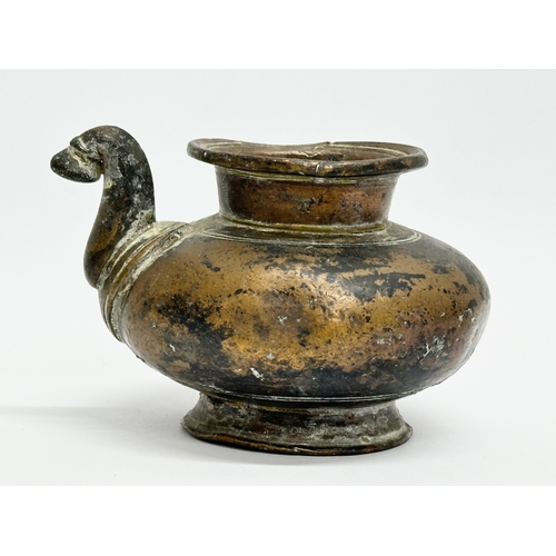 39 - An 18th Century bronze Lota Vessle. 10x9x7cm