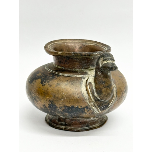 39 - An 18th Century bronze Lota Vessle. 10x9x7cm