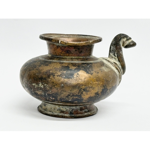 39 - An 18th Century bronze Lota Vessle. 10x9x7cm