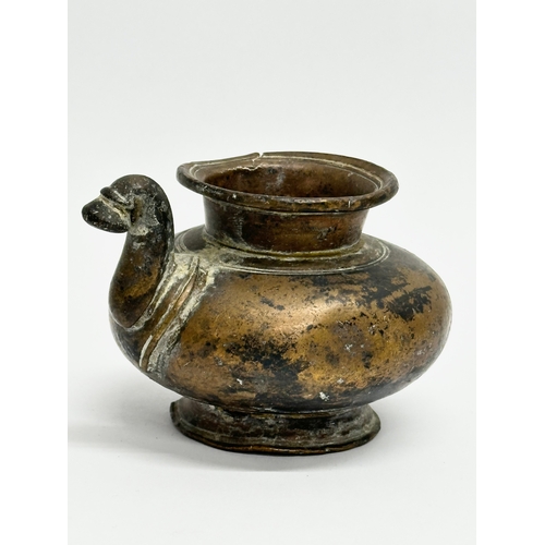 39 - An 18th Century bronze Lota Vessle. 10x9x7cm